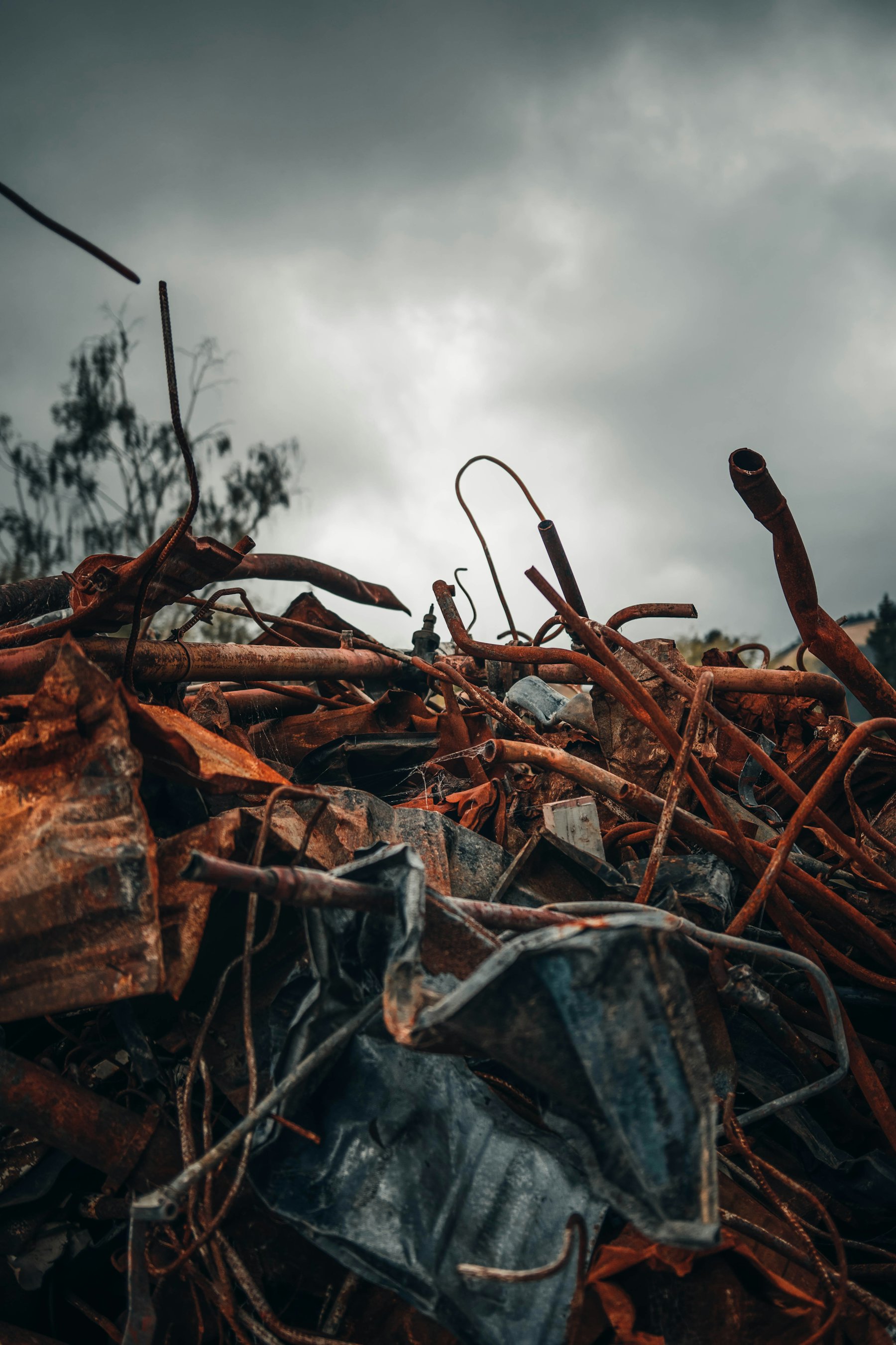Heap of rusted steel pipes and scrap iron